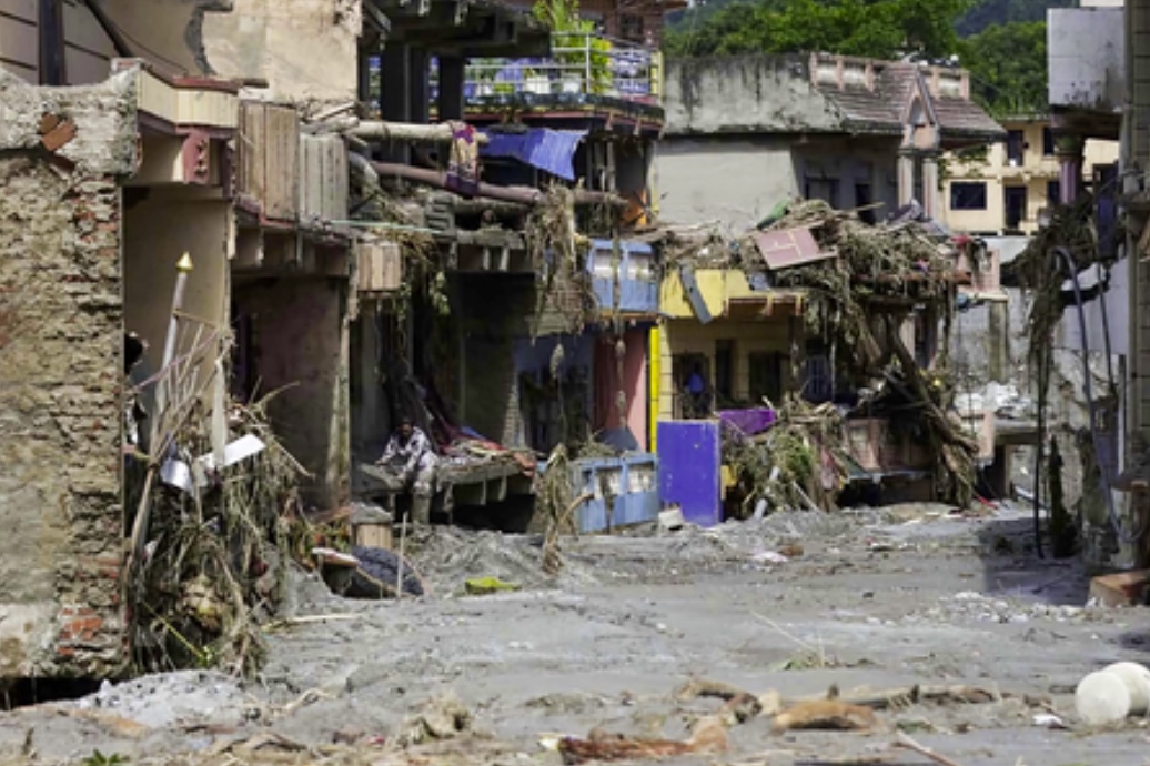 Flood damage affects homes and streets in Nepal.